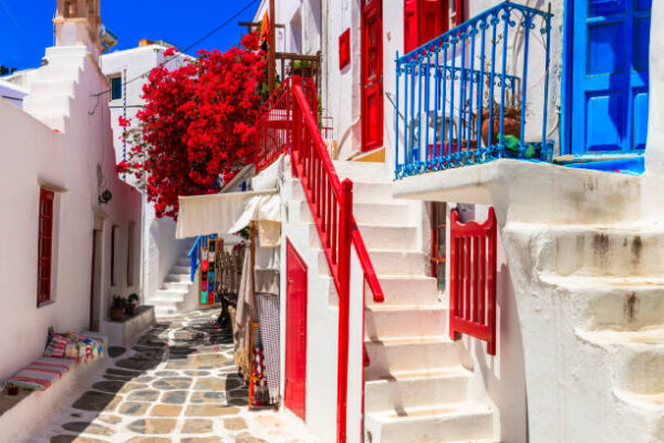 Authentic traditional Greece. Charming colorful floral streets of Mykonos island. Cyclades